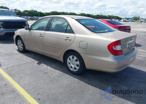 2002 Toyota Camry Le from USA, damaged, VIN 4T1BE32K42U014095